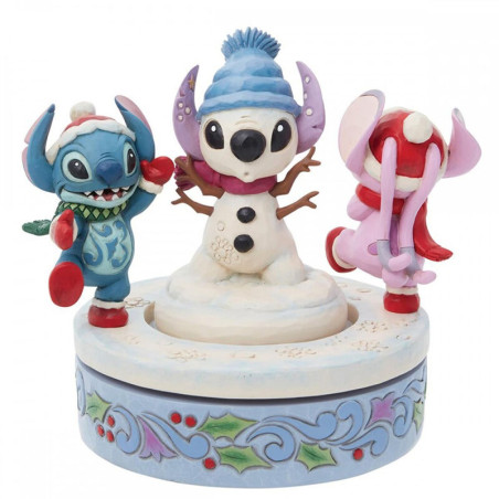 Figura decorativa enesco disney stitch y angel con mueco de nieve rotativo
